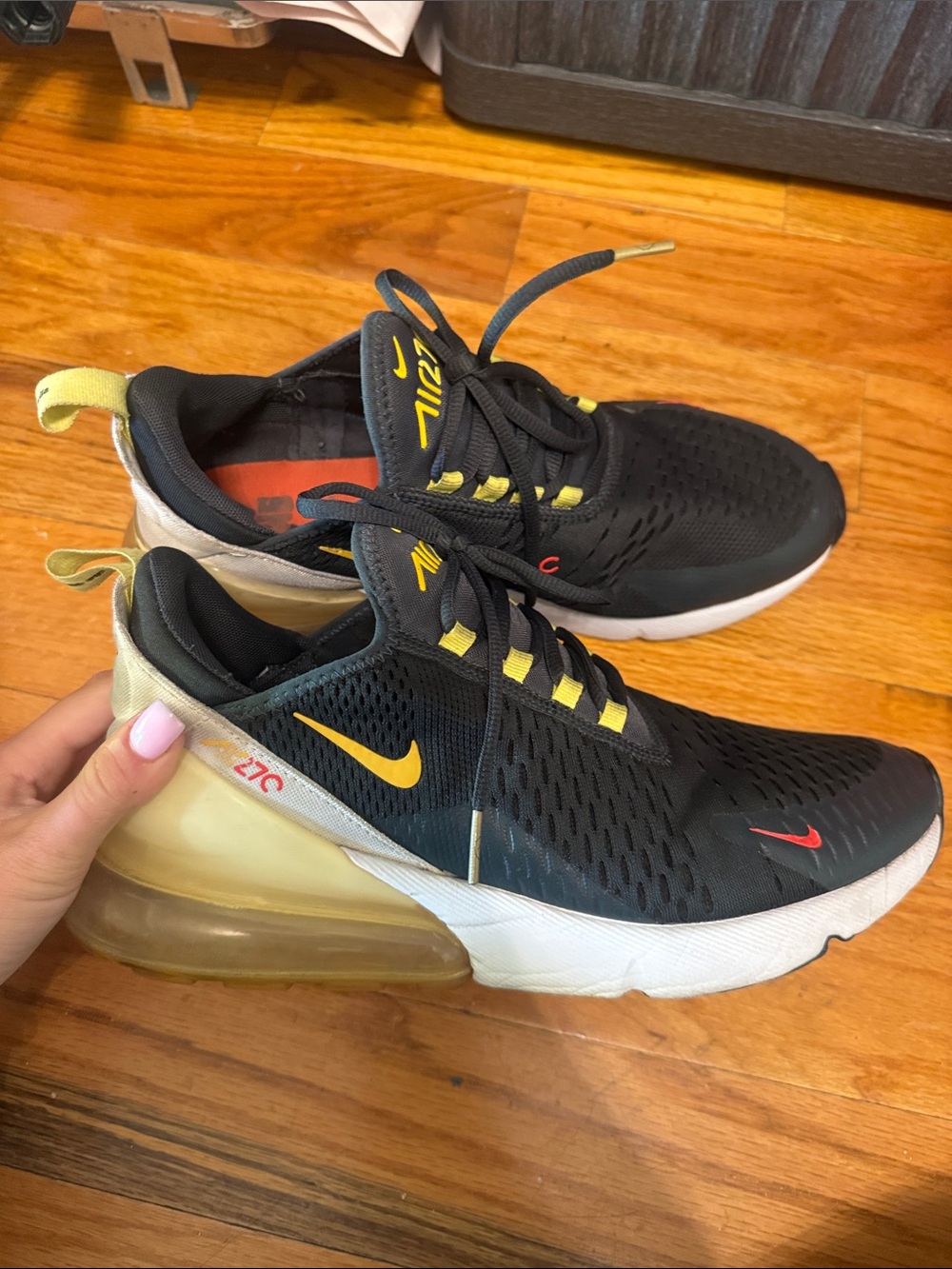 Nike Men's Black Athletic Shoes with Yellow & Red Accents